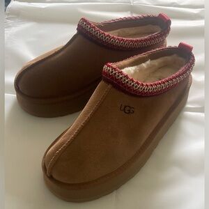 UGG Tan Slippers with Red Accents